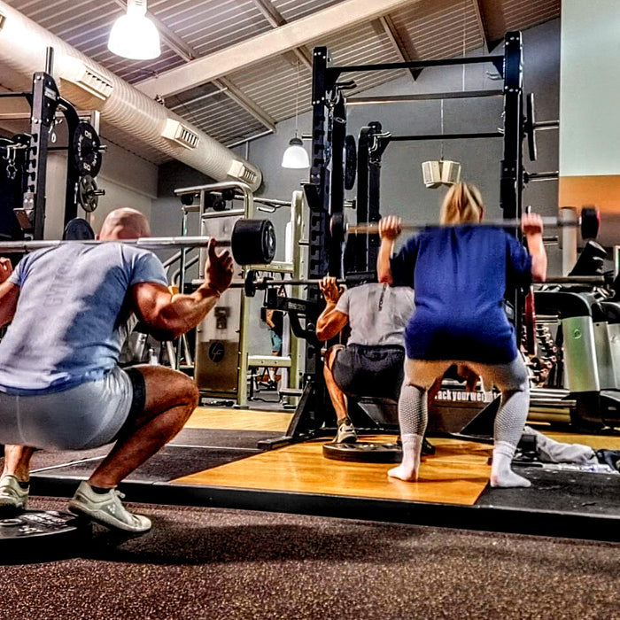Group fitness training Squat